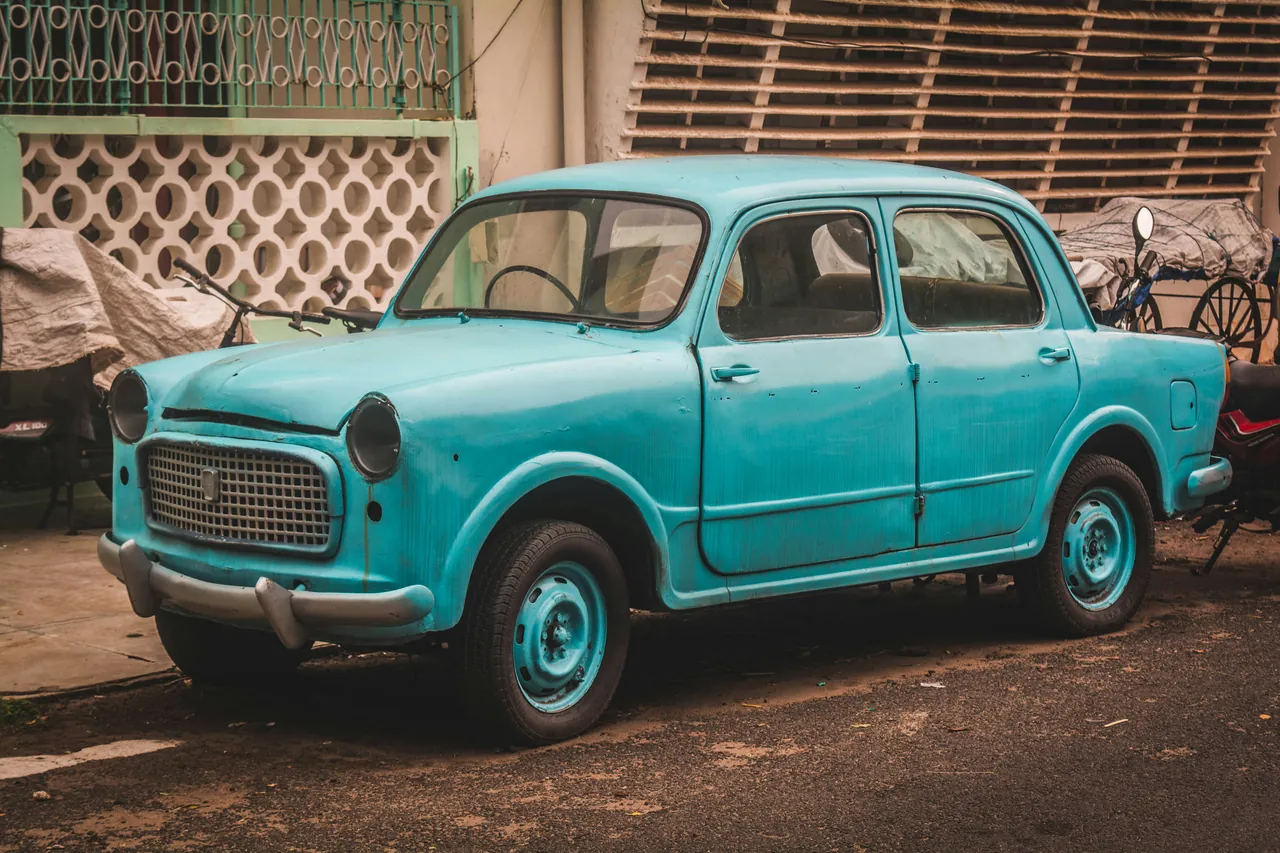 A destroyed car in the street. Probably a Soviet model. Photo by Rishi